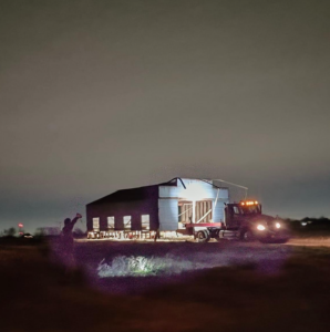 Crawford's Building Moving is moving a building during the night