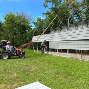 Crawford's Building Moving preparing to move a carport